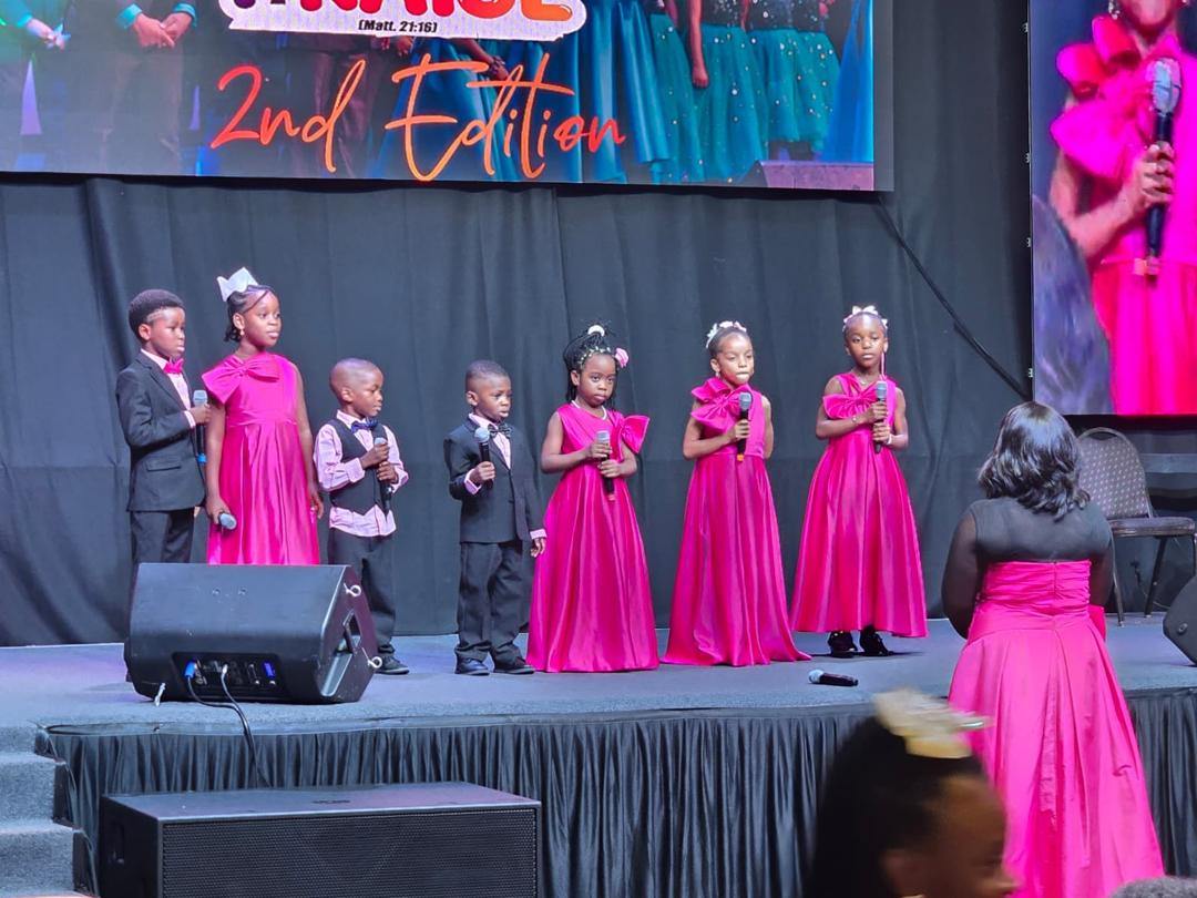 The junior performers in their pink costumes