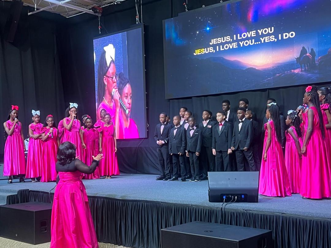The choir leading worship at Perfected Praise