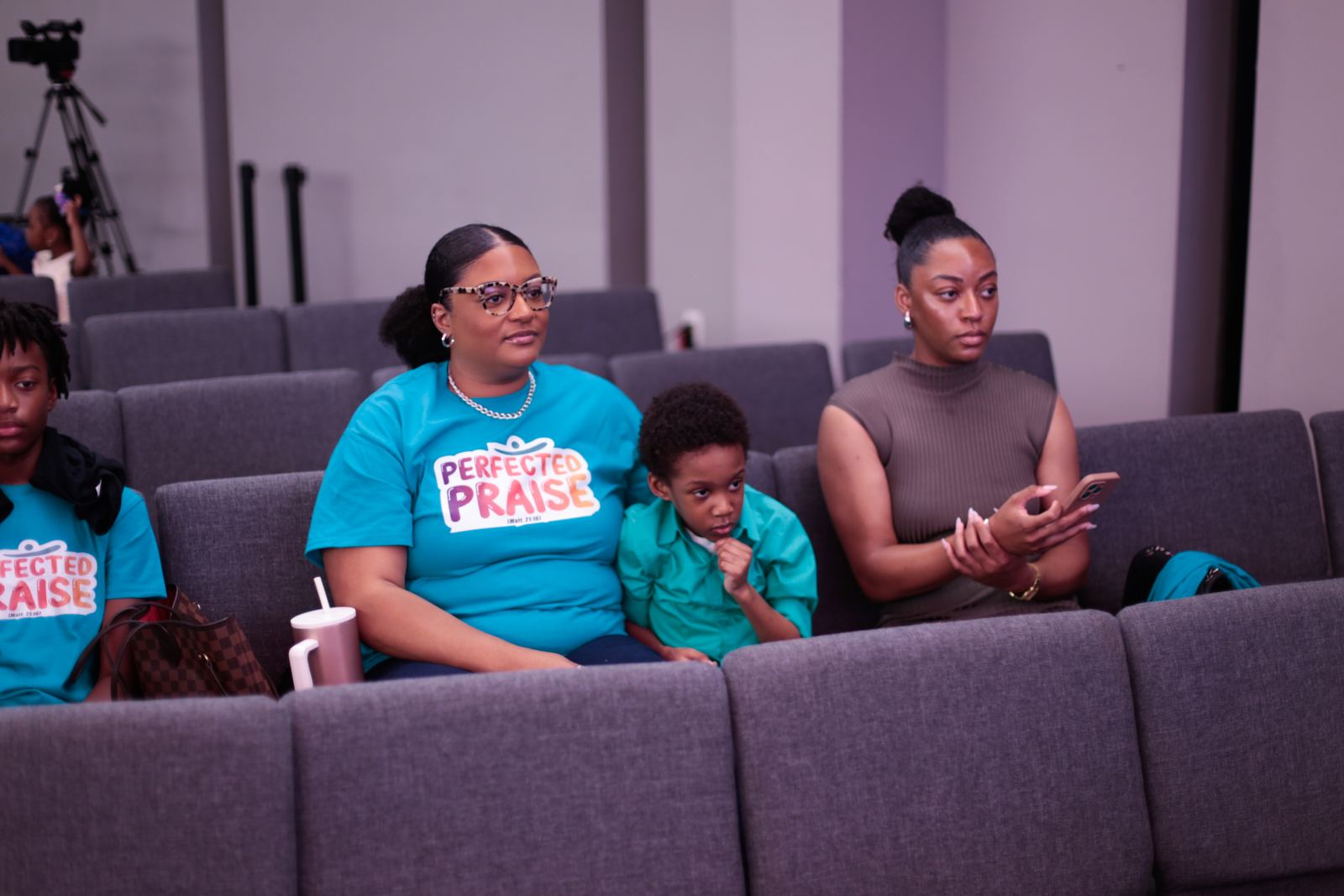 Families enjoying the Perfected Praise concert